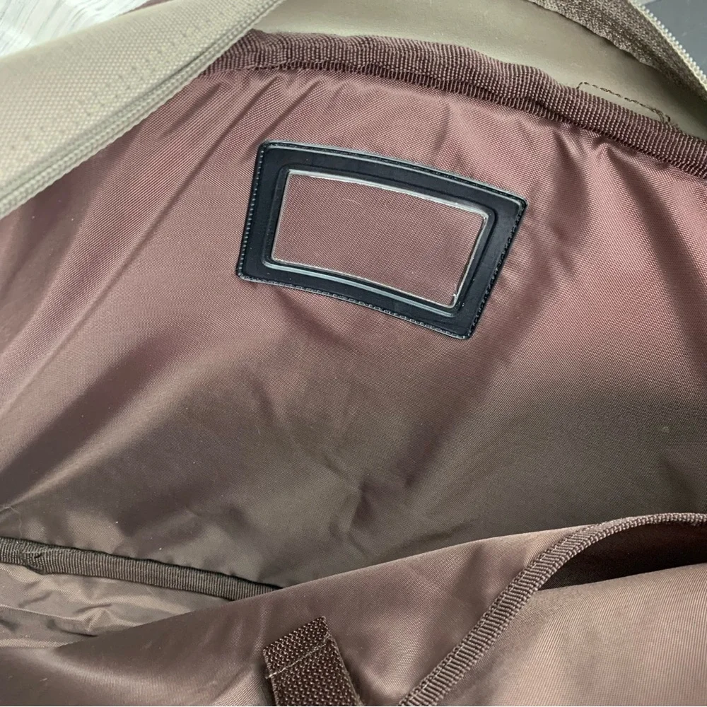 Golden Bell Tan and Brown Durable laptop bag with faux Leather Handle.